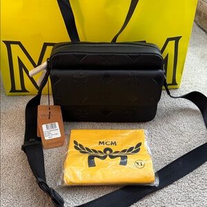 MCM Black Leather Aren Messenger Bag Authentic from MCM store